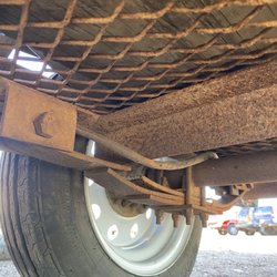 Alex's Radiator & Auto Repair - Broken spring.