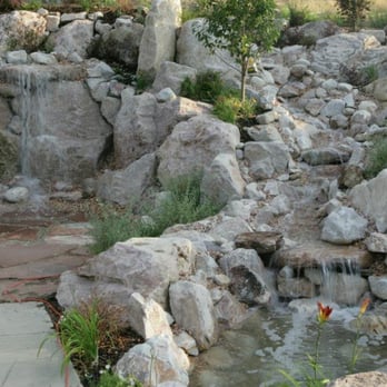 Loveland Landscape - a small waterfall in a rock garden - Landscaping Near Me - West Bountiful, Utah Loveland Landscape - a small waterfall in a rock garden - Landscaping Near Me - West Bountiful, Utah