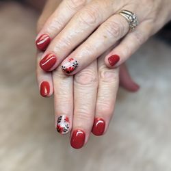 Q Spa Nails - Bold and elegant with these red floral nails at Q Spa Nails!