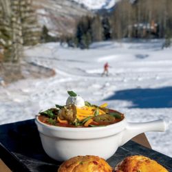 Grill On The Gore - Bowl of bison chili with jalapeño cornbread on the patio at the Vail Nordic Center