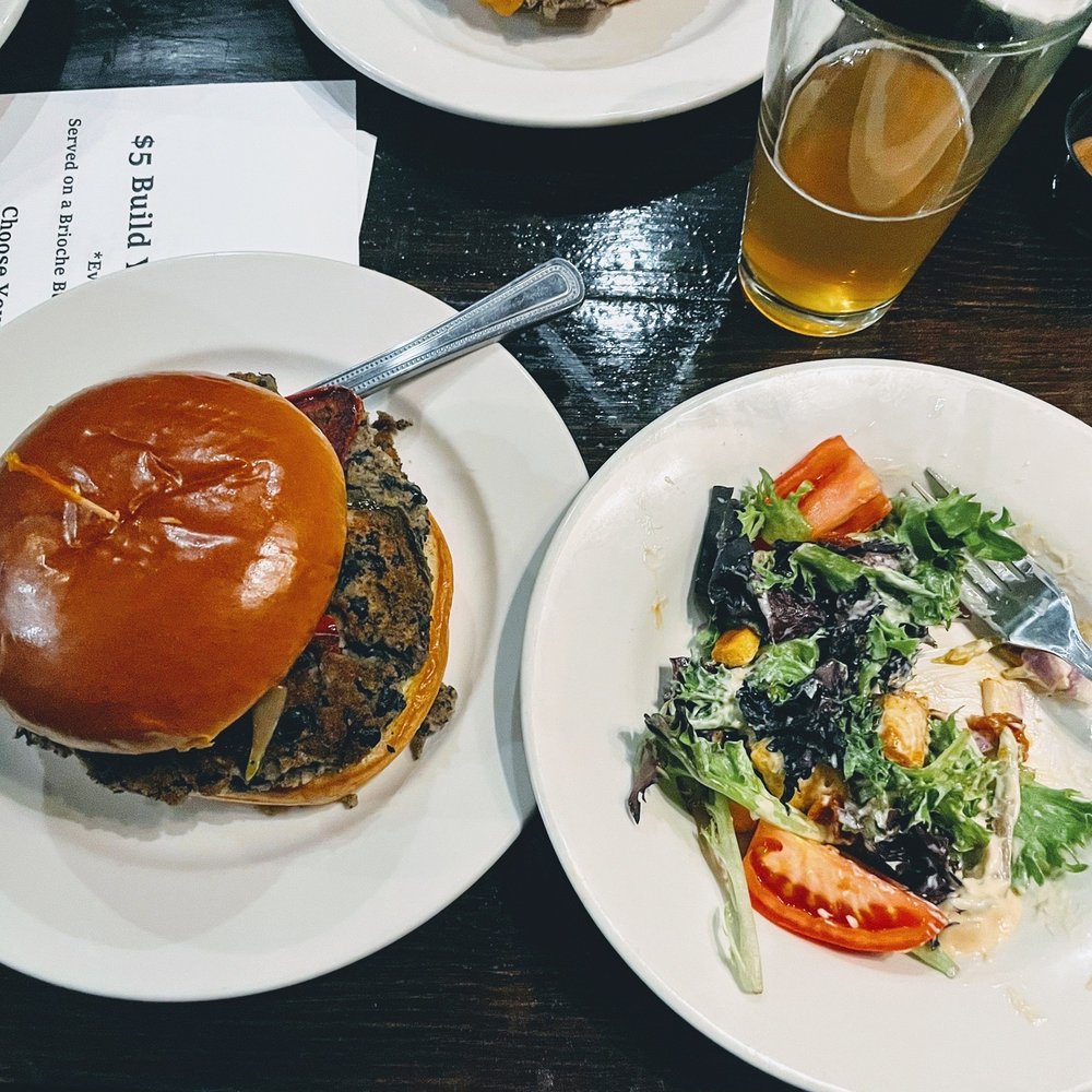 Hibernian Restaurant & Pub - Black bean burger and a side salad - Irish Near Me - Raleigh, North Carolina Hibernian Restaurant & Pub - Black bean burger and a side salad - Irish Near Me - Raleigh, North Carolina