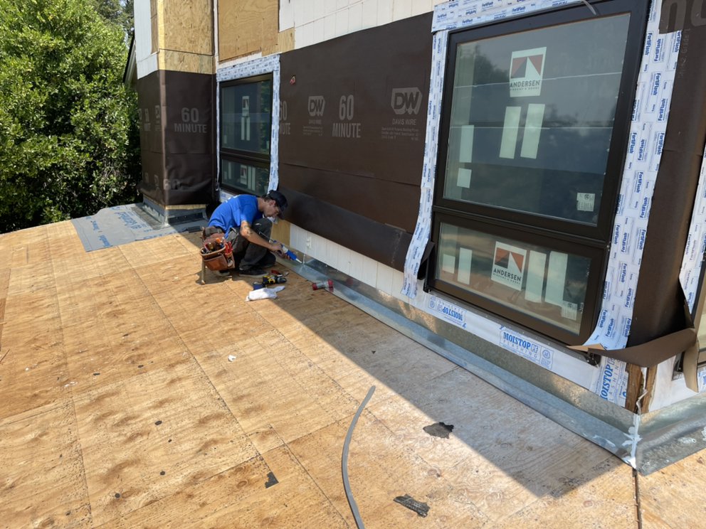 Slide of Rainoway Roofing