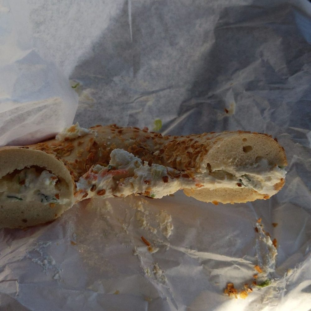 Onion Flagel w/ low fat Scallion and vegetable cream cheese. Onion Flagel w/ low fat Scallion and vegetable cream cheese.
