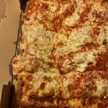 Belleville Pizza - Cheese slid all over the side from being in the driver's trunk. - Pizza Near Me - Belleville, New Jersey