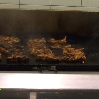 Chipotle Mexican Grill - Fresh chicken on the grill - Mexican Near Me - Bridgeton, Missouri