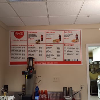 Triniman Kitchen - a menu on the wall - Caribbean Near Me - London, Ontario Triniman Kitchen - a menu on the wall - Caribbean Near Me - London, Ontario