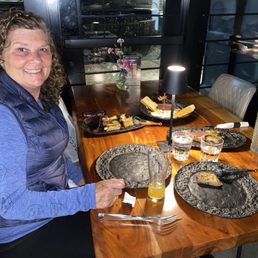 My lovely wife...incredible ribs, spinach cheese ravioli with Alfredo sauce and garlic bread for dipping...OMG