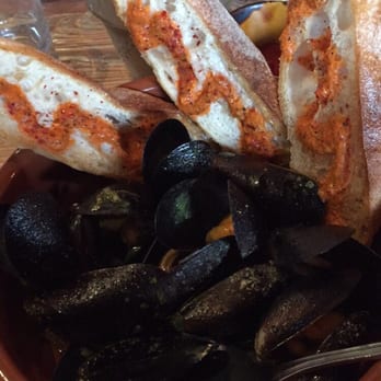 Lechon - Sautéed Mussels Chorizo, Garlic & Cilantro Butter w/Bread ~ - Tapas Bars Near Me - Portland, Oregon Lechon - Sautéed Mussels Chorizo, Garlic & Cilantro Butter w/Bread ~ - Tapas Bars Near Me - Portland, Oregon