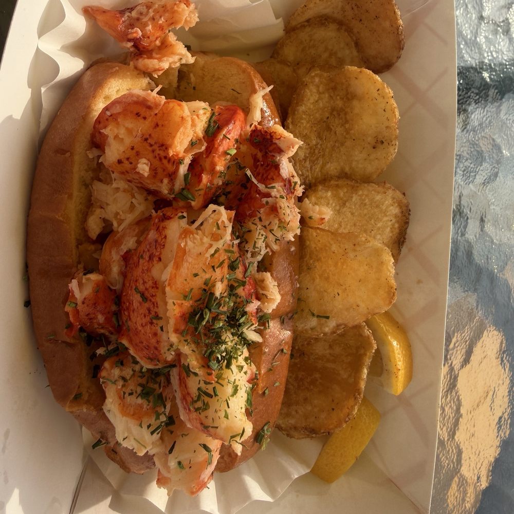 Olcott Lobster - Warm lobster roll/ house chips - Sandwiches Near Me - Olcott, New York