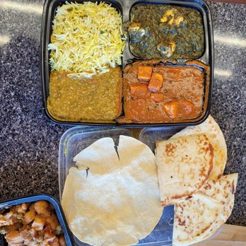 Curry Up Now Indian Restaurant and Catering - The Karol Bagh Kitty Party Thali Platter which comes with naan and a giant cripsy chip (sorry I don't know what it's called!) - Indian Near Me - Oakland, California Curry Up Now Indian Restaurant and Catering - The Karol Bagh Kitty Party Thali Platter which comes with naan and a giant cripsy chip (sorry I don't know what it's called!) - Indian Near Me - Oakland, California