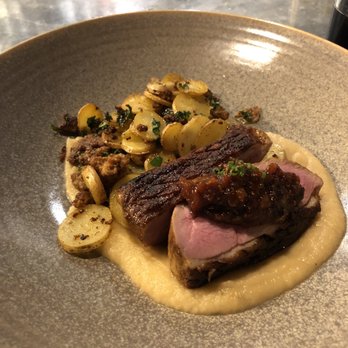 Tolon - Duck breast served over parsnip and apple purée. - New American Near Me - Fort Wayne, Indiana Tolon - Duck breast served over parsnip and apple purée. - New American Near Me - Fort Wayne, Indiana