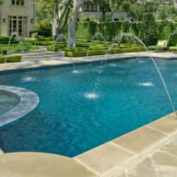 Elite Pools and Landscaping - Water features can give your pool a unique look - Landscaping Near Me - Frisco, Texas Elite Pools and Landscaping - Water features can give your pool a unique look - Landscaping Near Me - Frisco, Texas