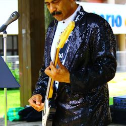 Penny Pincher Costume - Terry Rhodes as Lionel Richie Tribute. Jackson Square, from Penny Pincher Costumes Inc. Hamilton, Ont July 2024.