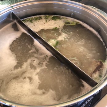 Shabu Restaurant - Pork broth (left), Vietnamese Pho broth (right). The Vietnamese Pho broth had three chunks of short rib, cilantro, and scallions. - Japanese Near Me - Quincy, Massachusetts Shabu Restaurant - Pork broth (left), Vietnamese Pho broth (right). The Vietnamese Pho broth had three chunks of short rib, cilantro, and scallions. - Japanese Near Me - Quincy, Massachusetts