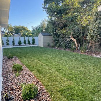 AG Lawn Care Service - a backyard with a lawn and a fence - Landscaping Near Me AG Lawn Care Service - a backyard with a lawn and a fence - Landscaping Near Me