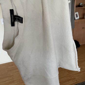 Freshly Folded - a different jacket - was completely white before. now is grey - Laundry Services Near Me Freshly Folded - a different jacket - was completely white before. now is grey - Laundry Services Near Me