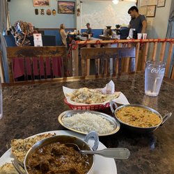 Everest Cuisine - Lamb Bhuna and curry egg plant dish with a Naan Basket!
