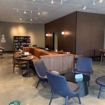 Starbucks - a coffee shop with chairs and tables - Coffee & Tea Near Me - Winchester, Virginia