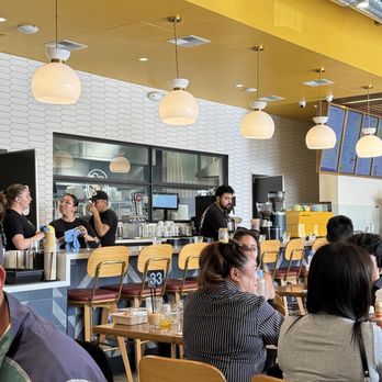 Poached Kitchen - See the staff standing around chatting. - Coffee & Tea Near Me - Anaheim, California Poached Kitchen - See the staff standing around chatting. - Coffee & Tea Near Me - Anaheim, California