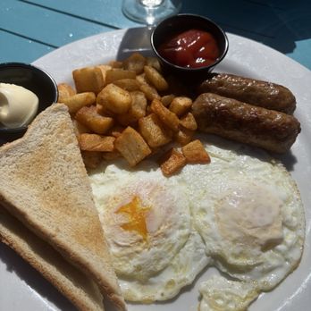 The Rooftop Lounge - 2 egg breakfast with sausage and brioche toast - Lounges Near Me - Laguna Beach, California The Rooftop Lounge - 2 egg breakfast with sausage and brioche toast - Lounges Near Me - Laguna Beach, California