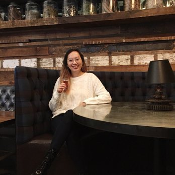 Forbidden Root - Sitting at the booth next to our table for a photo op! - Brewpubs Near Me - Chicago, Illinois
