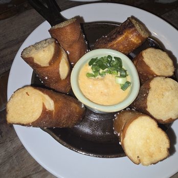 Melzingah Tap House - Crispy pretzel bites with house made cheese sauce. - Beer Bar Near Me - Beacon, New York Melzingah Tap House - Crispy pretzel bites with house made cheese sauce. - Beer Bar Near Me - Beacon, New York
