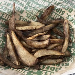 a basket of fries on a table