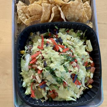 Freebirds World Burrito - Monster bowl (half ground beef and half chicken) with a side of chips - Mexican Near Me - Austin, Texas Freebirds World Burrito - Monster bowl (half ground beef and half chicken) with a side of chips - Mexican Near Me - Austin, Texas