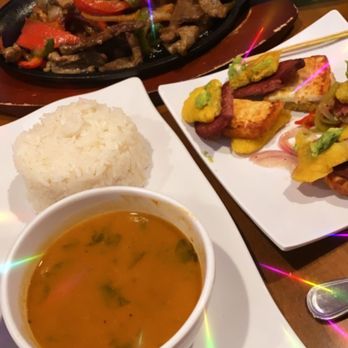 Buccann - Entree: (Bistec Salteado)Grilled steak/peppers, white rice and beans.  Appetizer(Trio Cibaeno) salami, fried cheese, tostones and guacamole. - Latin American Near Me - Philadelphia, Pennsylvania