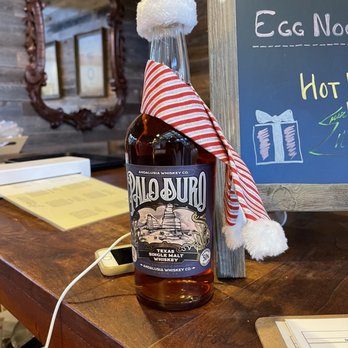 Andalusia Whiskey - a bottle of bourbon on a table - Distilleries Near Me - Blanco, Texas Andalusia Whiskey - a bottle of bourbon on a table - Distilleries Near Me - Blanco, Texas