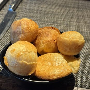 Fogo de Chão - Warm pão de queijo (cheese bread) - Brazilian Near Me - Elmhurst, New York Fogo de Chão - Warm pão de queijo (cheese bread) - Brazilian Near Me - Elmhurst, New York