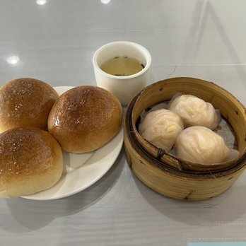 Fook Lam - Yummy baked char siu manapua and steamed shrimp dumplings...plus complimentary hot tea! - Dim Sum Near Me - Honolulu, Hawaii Fook Lam - Yummy baked char siu manapua and steamed shrimp dumplings...plus complimentary hot tea! - Dim Sum Near Me - Honolulu, Hawaii