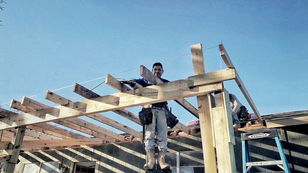 Slide of Salvador Roofing Services