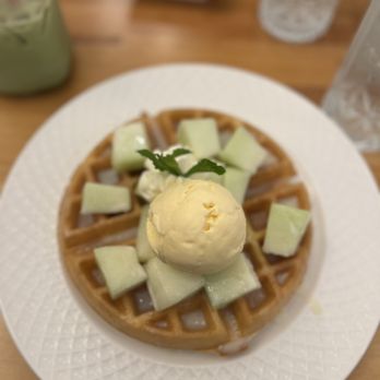 Prince Tea House - Waffle with honeydew, condensed milk drizzle, topped with vanilla ice cream and mint leaves - Tea Rooms Near Me - Staten Island, New York Prince Tea House - Waffle with honeydew, condensed milk drizzle, topped with vanilla ice cream and mint leaves - Tea Rooms Near Me - Staten Island, New York