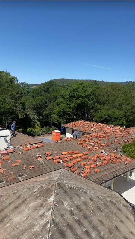 Slide of Aguilar Roofing