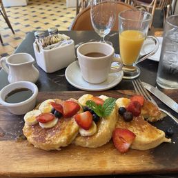 Breakfast special they have a fancy name for it but basically pancakes with fruit. Breakfast special they have a fancy name for it but basically pancakes with fruit.