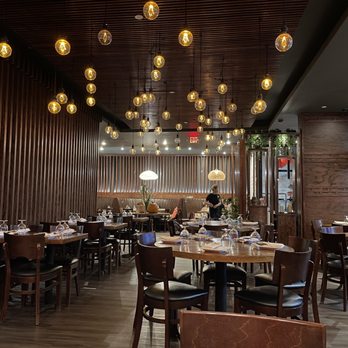 Ginkgo Sichuan Cuisine - a dining room with a lot of tables and chairs - Szechuan Near Me - Fairfield, Connecticut
