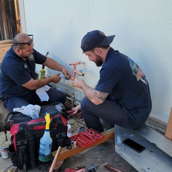 All American Plumbing - Brandon (in the trench) and Jeremy putting in all the new valves    for the new water main. - Plumbing Near Me - Poway, California