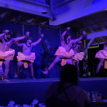 Toa Luau - Holiday themed bows ;) these guys were so entertaining - Cultural Center Near Me - Haleiwa, Hawaii
