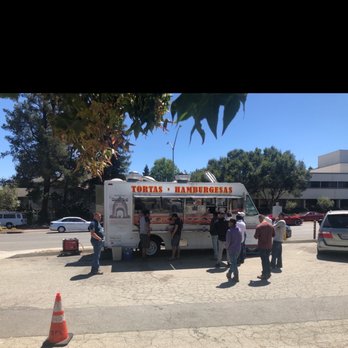 Chicos Grill - a group of people standing in front of a food truck - Mexican Near Me - Redwood City, California Chicos Grill - a group of people standing in front of a food truck - Mexican Near Me - Redwood City, California