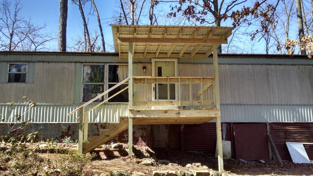 Slide of JC Metal Roofing