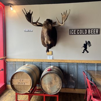 Red Moose Brewing Company - a moose head mounted on the wall - Breweries Near Me - Pittsboro, North Carolina Red Moose Brewing Company - a moose head mounted on the wall - Breweries Near Me - Pittsboro, North Carolina