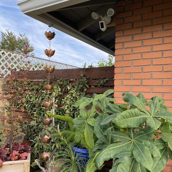Rainco Gutters - Brandon and Sam suggested the copper rain chain to complement the red brick vs traditional downspout. - Gutter Services Near Me - Westminster, California