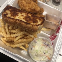 a tray of fries and coleslaw a tray of fries and coleslaw