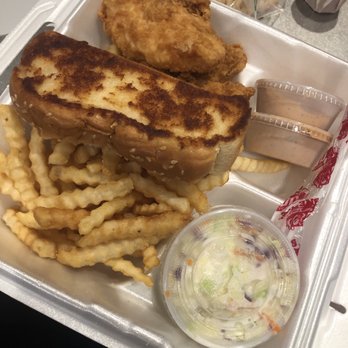 Raising Cane's Chicken Fingers - a tray of fries and coleslaw - Chicken Shop Near Me - Avon, Ohio Raising Cane's Chicken Fingers - a tray of fries and coleslaw - Chicken Shop Near Me - Avon, Ohio