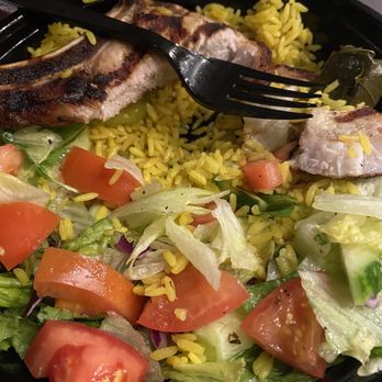 Chirping Chicken - Pork chop special with rice and Greek salad - American Near Me - New York, New York Chirping Chicken - Pork chop special with rice and Greek salad - American Near Me - New York, New York