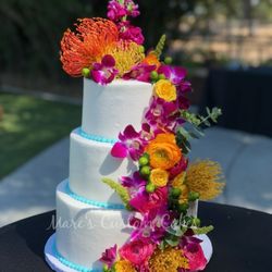 Mare's Custom Cakes - 3 tier wedding cake  with buttercream and fresh flowers.   Serves 75