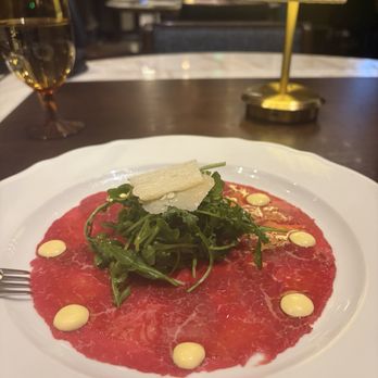 Caramá - Prime Beef Carpaccio* - Italian Near Me - Las Vegas, Nevada Caramá - Prime Beef Carpaccio* - Italian Near Me - Las Vegas, Nevada