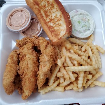 Raising Cane's Chicken Fingers - Caniac combo - 6 pieces of chicken, fries, coleslaw, toast, and 2 sauces. Didn't take a picture of my sweet tea.. - Chicken Shop Near Me - Mililani, Hawaii