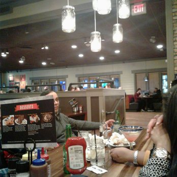 Smokey Bones Ronkonkoma - A shot of the long, arranged table, view from my right angle - American Near Me - Ronkonkoma, New York